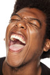 © vladimirfloyd - Very happy african american young man with funny face on white background