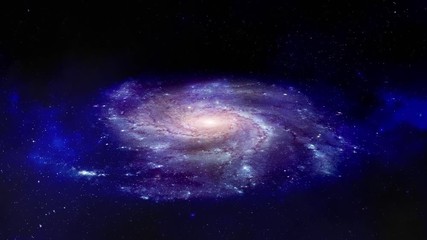 Wall Mural - Rotating spiral galaxy surrounded by the stars in our vast Universe