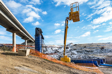 Wall Mural - Lifting platform in the construction of a bridge