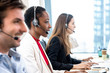 Diverse call center team working in office