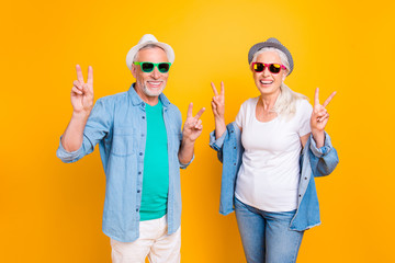 Happiness friendship denim style stylish trend cool hipster concept. Photo portrait of two funky swag mad excited with toothy smile in white clothes partners making victory symbol isolated background