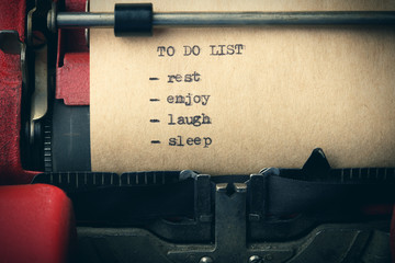 Fototapete - To do list sleep, relax, enjoy,laugh - text message on the typewriter close-up