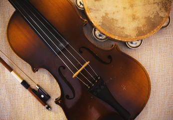 Wall Mural - Old Violin From Czechoslovakia and Tambourine