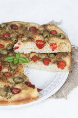 Sticker - Homemade oven-baked  italian  focaccia - focaccia Barese, with olives, olive oil, tomatoes, herbs