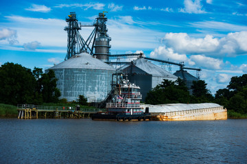 Tugboat and Barge on the Rappahannock River at The Tappahannock Grain Facility