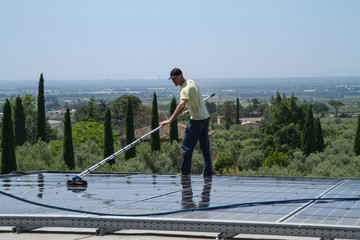 Wall Mural - washing and cleaning photovoltaic panels