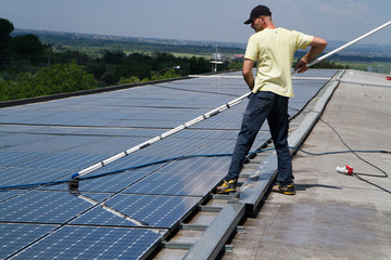 Wall Mural - washing and cleaning photovoltaic panels