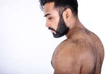 Topless Portrait Of Handsome Hairy Young Man, Isolated On White Background