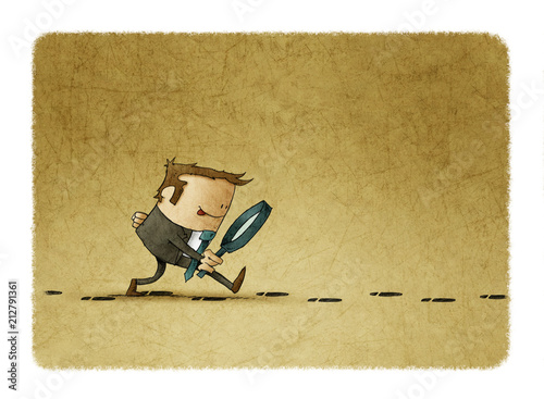 Fotografía businessman with a magnifying glass investigate suspicious footprints