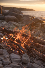 Poster - fire burns near the sea