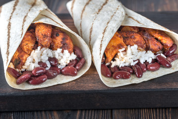 Wall Mural - Chicken burritos on the wooden board