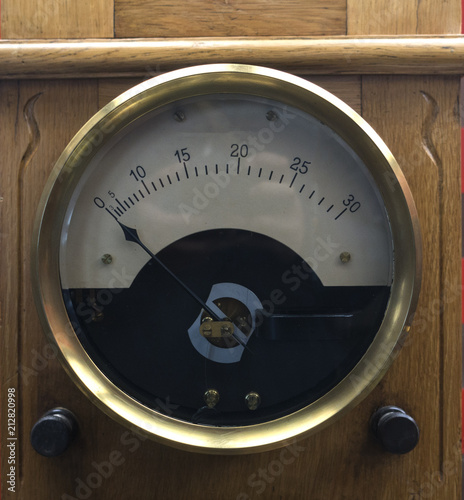 Vintage Analogue Ammeter Made Of Metal On A Wooden Work Bench