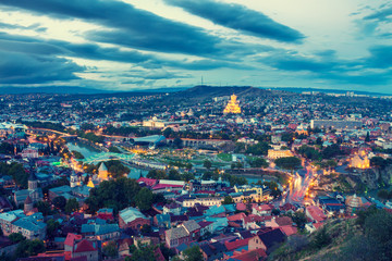 Fototapete - Beautiful evening panoramic view of Tbilisi after sunset, Georgia country
