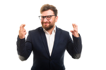 Wall Mural - Portrait of business man showing double cross fingers gesture.