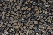 Dried Chopped Stacked Firewood Logs