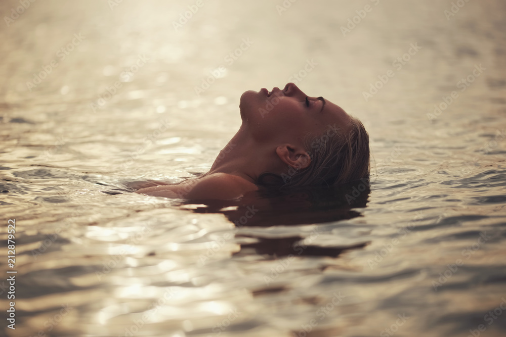 beautiful blonde girl in water Stock Photo | Adobe Stock
