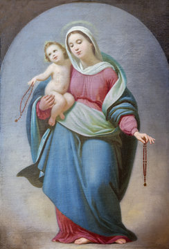 PARMA, ITALY - APRIL 17, 2018: The Painting of Madonna of Rosary in church Chiesa di Ognissanti by Giovanni Gaibazzi (1808 – 1888).