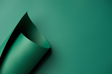 close-up view of beautiful bright abstract green paper background