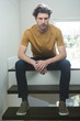 © Wavebreak Media - Worried man sitting at home