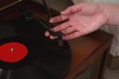 © Wavebreak Media - Woman playing a gramophone at home