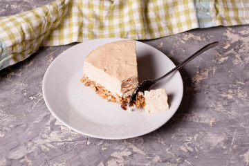 Wall Mural - Caramel cheesecake on a white plate