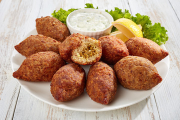 Sticker -  kibbeh stuffed with fried beef ragout