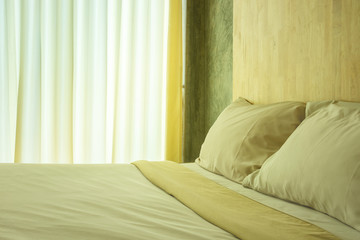 Wall Mural - Permesean Pillows And Permesean Towels On Bed In Bedroom.