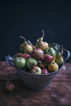 Organic Apples And Pears In A Rustic Bucket