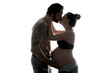 © Louis-Photo - against the light portrait of pregnant couple