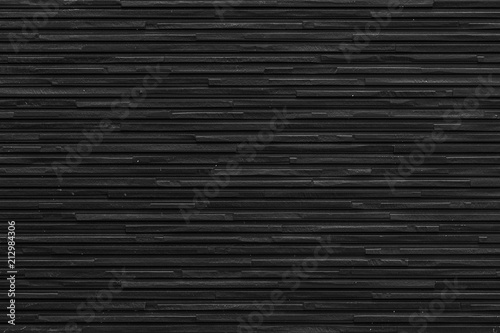 Fototapeta Black stone wall pattern and background