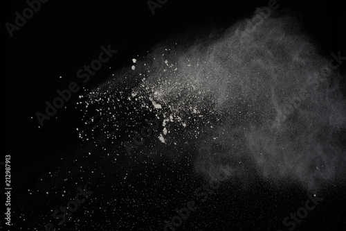 Cuadros en Lienzo Explosion of white powder isolated on black background