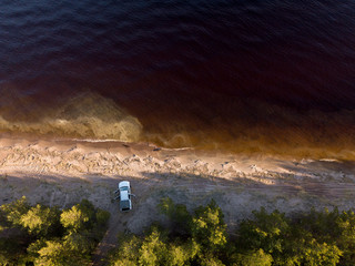 Wall Mural - Car by the water