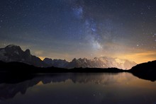 Mont Blanc Massif At Night With The Milky Way, Reflected In Lac De Chesserys, Aiguilles De Chamonix On The Left, Montblanc On The Right, Chamonix, France, Europe