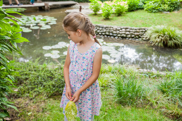 Cute Happy Child in Nature