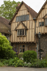 Wall Mural - Half timbered medieval houses just inside the King's Gate in the ancient city walls of Winchester, Hampshire, UK