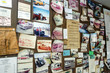 © Julian - Board with memorabilia and postcards of vintage cars