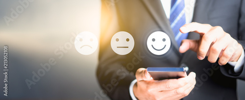 Fotografía Businessman pressing happy icon, Customer service evaluation concept