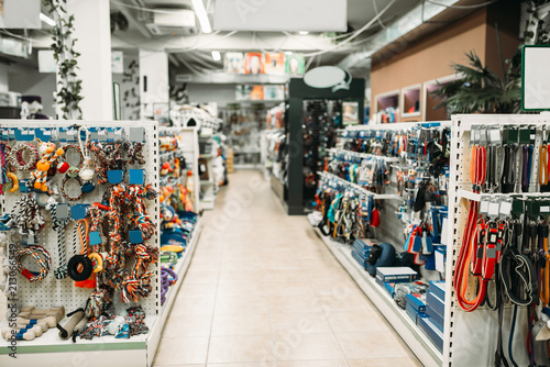 Pet shop interior, shelves with accessories © Nomad_Soul