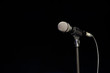 © nagaets - Black classic microphone on black dark background. Music and concert concept.