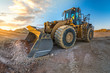 © ADDICTIVE STOCK - Bulldozer on roadside of unpaved highway