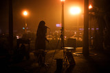Fototapeta Morze - Silhouette of Street Performer