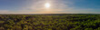 Panoramic drone photo with the sun in the middle