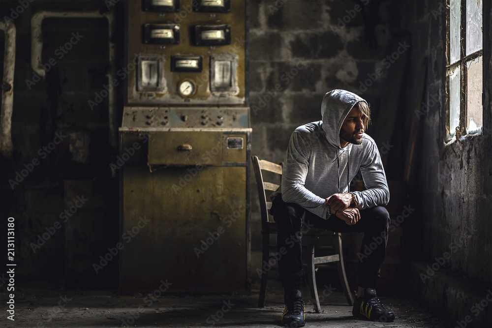 Man Sitting Alone In Dark Room Stock Photo Adobe Stock