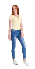 Wall Mural - Young woman in stylish jeans on white background