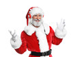 © New Africa - Santa Claus listening to Christmas music on white background