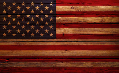 American flag of the United States with natural textures and faded background.