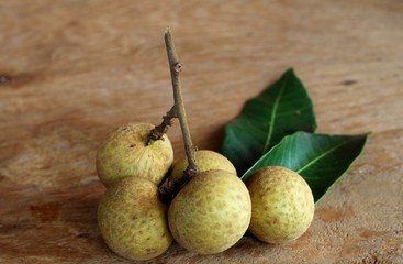 longan. fresh on wooden background