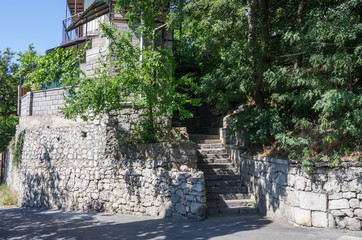 Wall Mural - Russia, the Republic of Crimea, the city of Alupka. 06/09/2018: Lenin Street. Summer