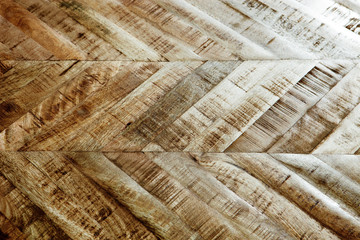 Wall Mural - Vintage wooden parquet background. Top view of wooden texture. Herringbone, chevron flooring pattern. 