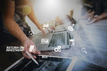 Poster - Business team meeting present. Photo professional investor working with new startup project. Finance managers meeting.Digital tablet laptop computer design smart phone using. Blurred background